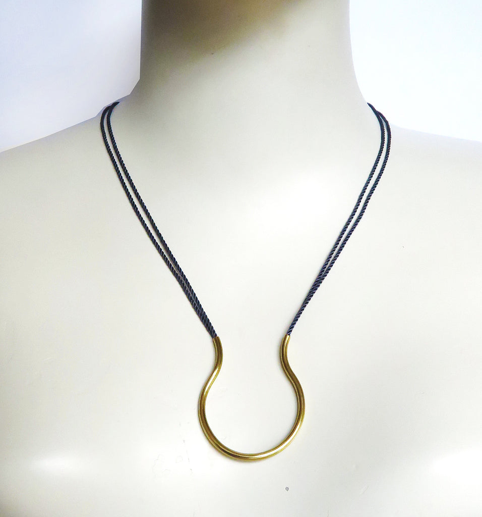 Útero Necklace. Small pendant with cord.